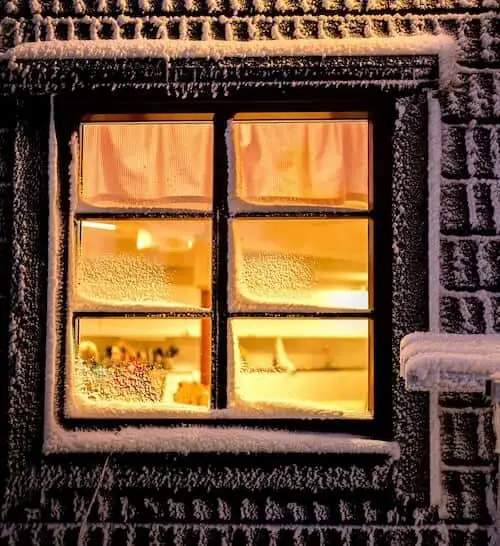 warm house with snowy window