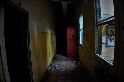 Places to avoid putting dog crate creepy abandoned hallway far from family