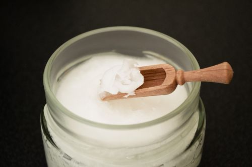How to give coconut oil to your dog orally topically by mouth on skin